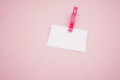 High angle view of thermometer on white background