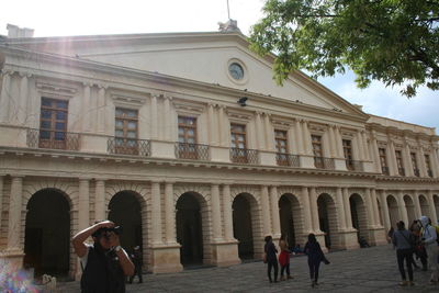 Group of people in front of historical building