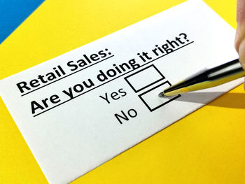 High angle view of information sign on table