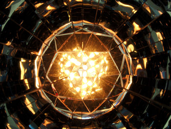 Close-up of illuminated light bulb
