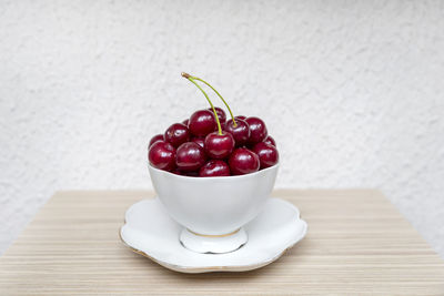 Close-up of raspberries in bowl on table