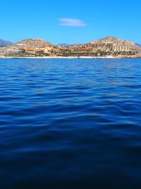 Scenic view of sea against clear blue sky