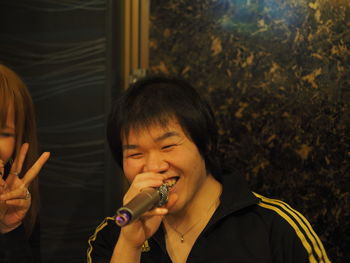 Portrait of a smiling girl holding food