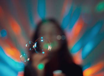 Close-up of bubbles against blurred background