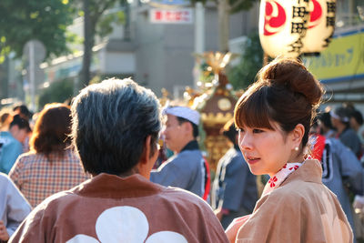 Rear view of woman looking at city
