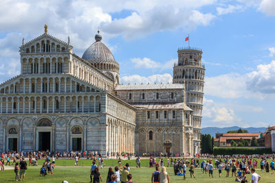 Group of people in front of historical building