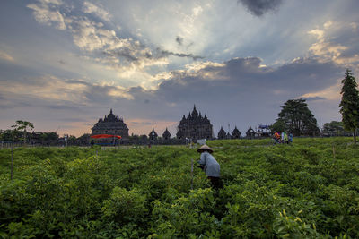 Panoramic view of traditional building against sky during sunset