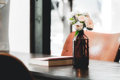 Close-up of flower vase on table