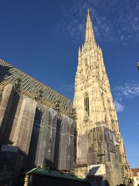 Low angle view of temple against blue sky