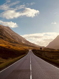 Empty road against sky