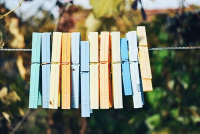 Close-up of clothespin hanging on clothesline