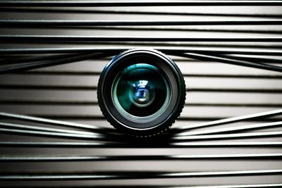 Close-up of camera on blinds