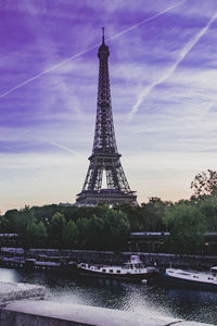 View of tower against cloudy sky