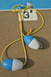 Close-up of umbrella on beach