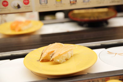 Close-up of bread in plate on table