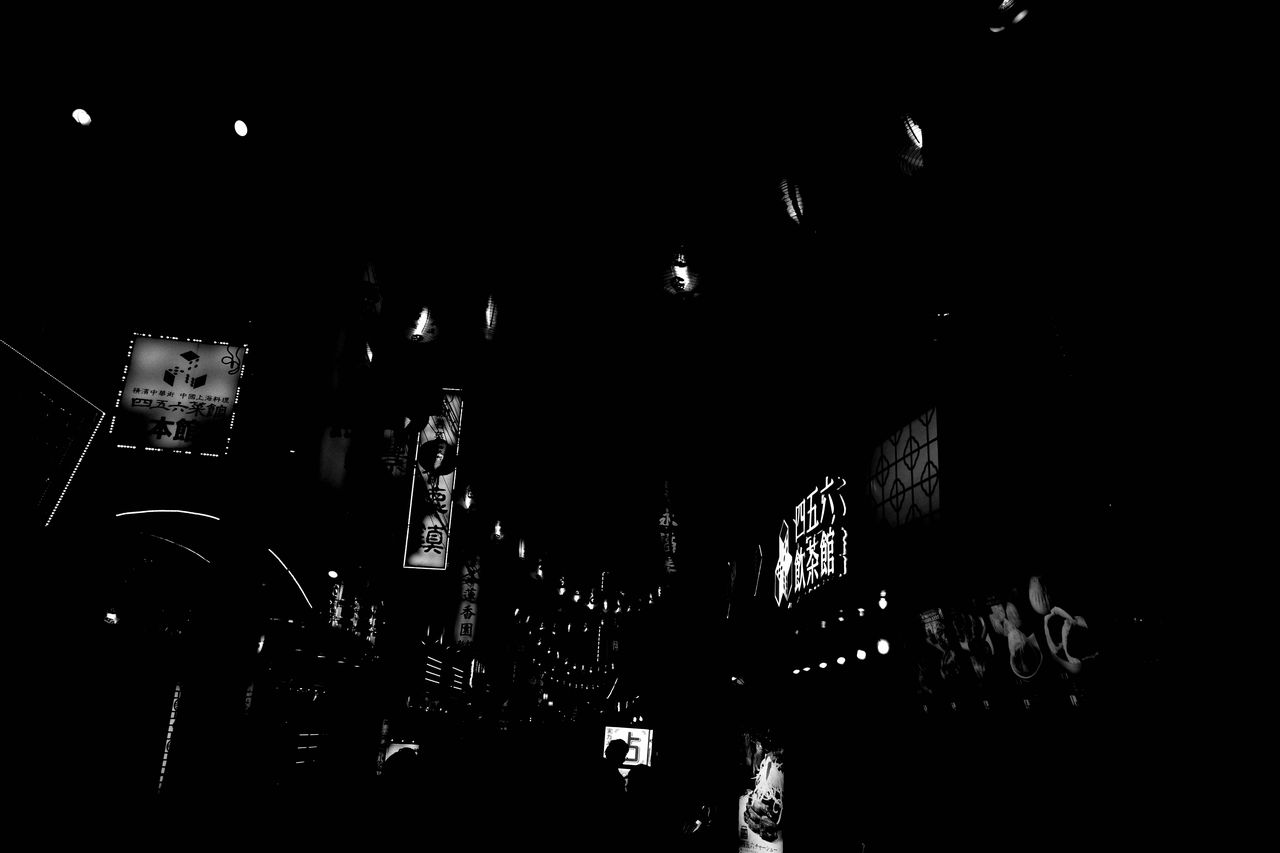 darkness, black and white, night, black, monochrome photography, illuminated, monochrome, architecture, font, midnight, dark, built structure, no people, city, concert, building exterior