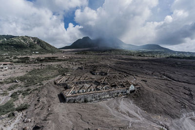 Panoramic view of landscape against cloudy sky