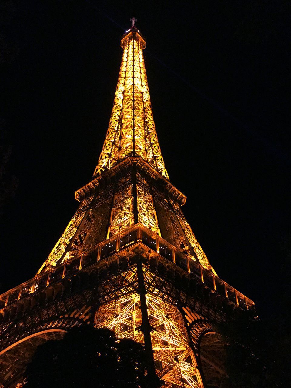 illuminated, architecture, low angle view, night, built structure, famous place, religion, international landmark, building exterior, travel destinations, spirituality, place of worship, tower, travel, tall - high, tourism, sky, capital cities, no people