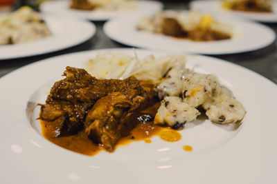 Close-up of food in plate on table