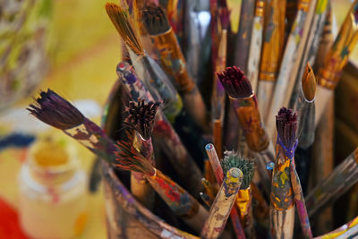 High angle view of paintbrushes in container