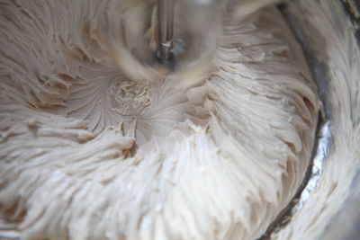 Close-up of dough in mixing bowl