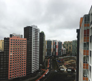 Buildings in city against sky