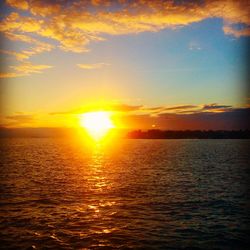 Scenic view of sea at sunset