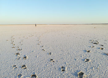 Scenic view of a salt lake against the sky