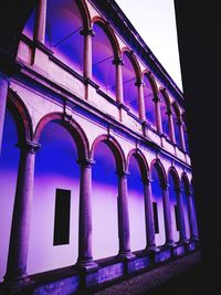Low angle view of illuminated building at night