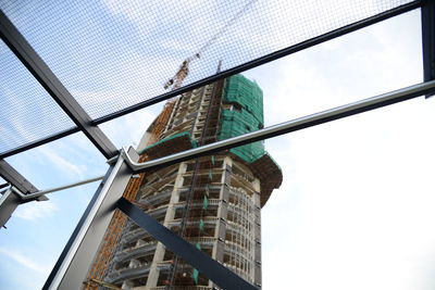 Low angle view of modern building against sky