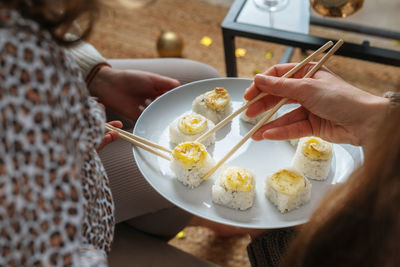 Midsection of woman preparing food