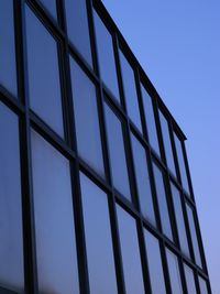 Low angle view of modern building against clear sky