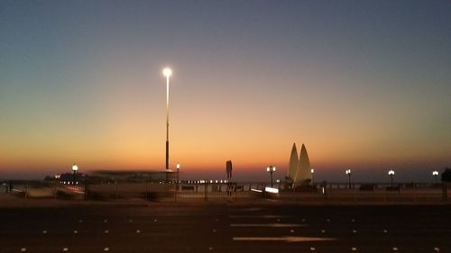 Street light against clear sky at night