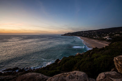 Scenic view of sea against sky during sunset