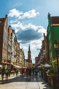 Buildings in city against sky