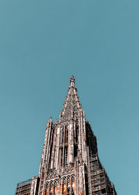 Low angle view of temple building against clear sky