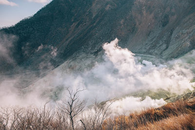 Scenic view of tree mountains against sky