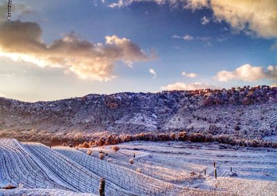 Scenic view of mountains against sky during winter