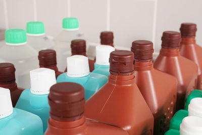 Close-up of multi colored bottles