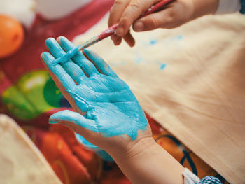 Close-up of painted hand