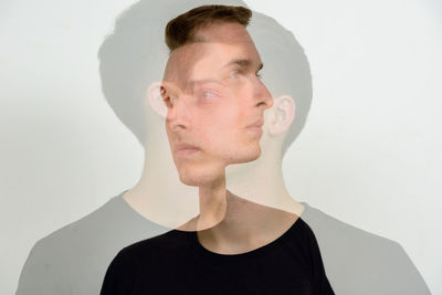 Digital composite of man against white background