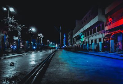 View of illuminated street at night