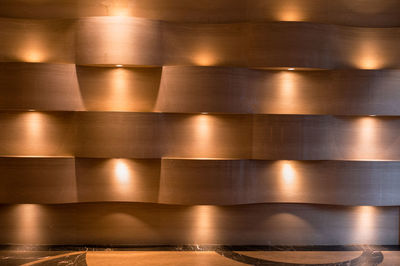 Close-up of illuminated wooden wall