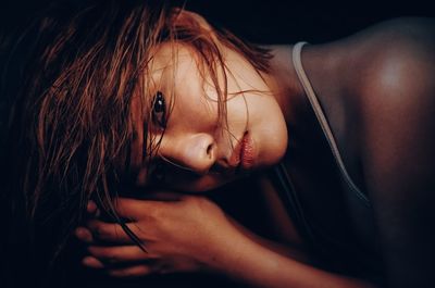 Close-up portrait of young woman