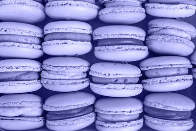 Macaron colored in trendy color of year 2022 very peri background. using color 17-3938