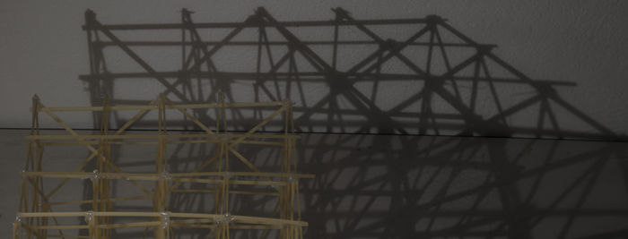 Metal structure against sky