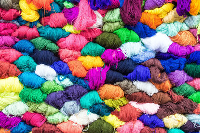 Full frame shot of colorful yarns for sale at market