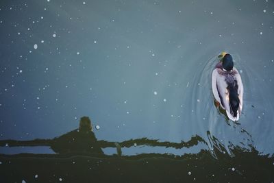 Reflection of a man on water