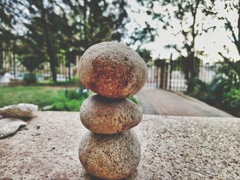 Close-up of stone stack on rock