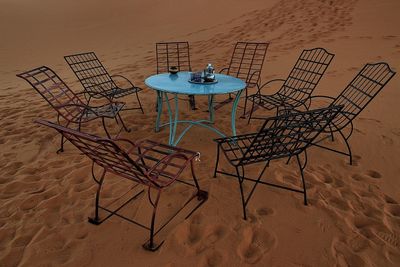 Chairs and table on beach